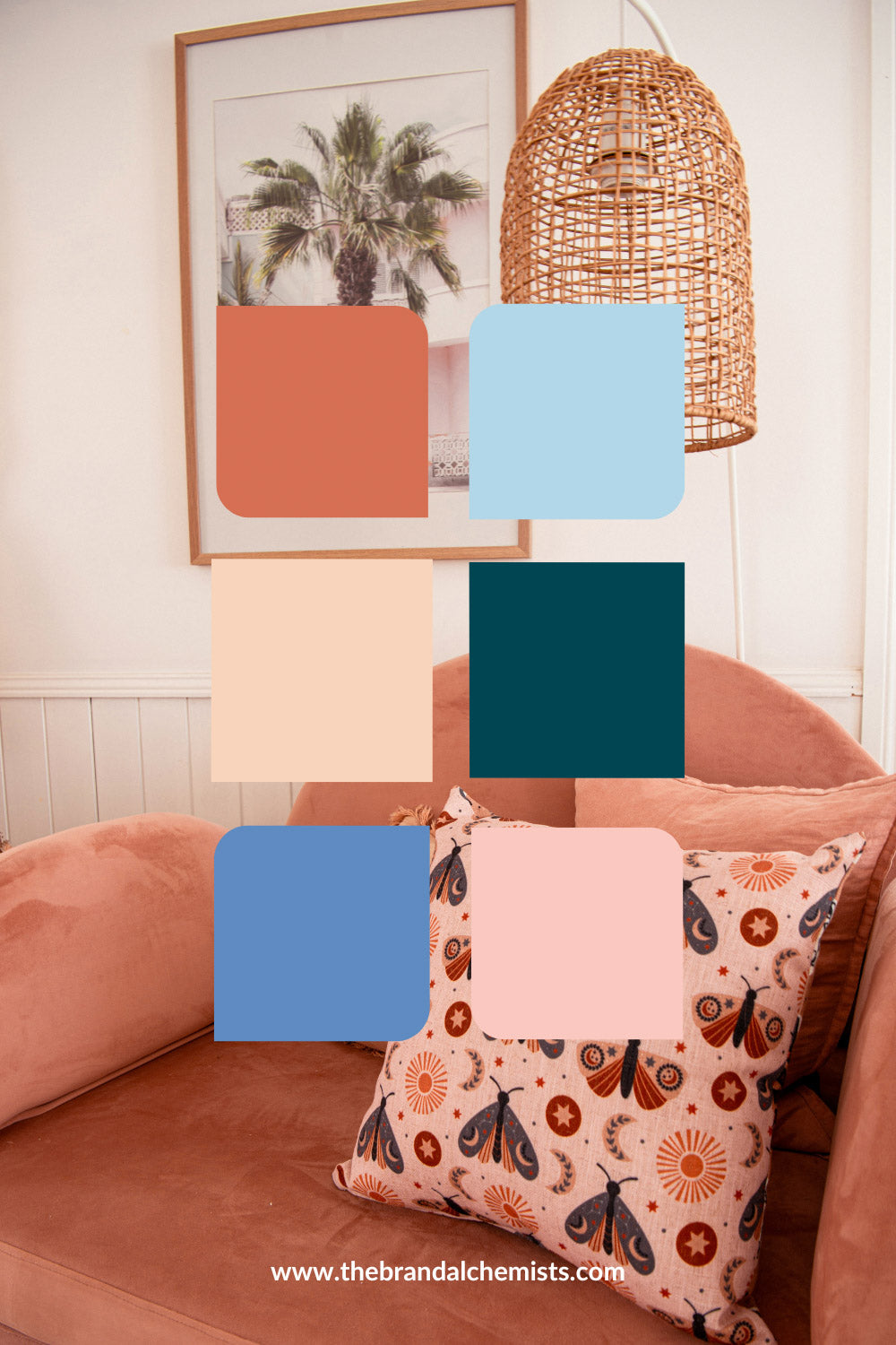 Joyful Boho color palette swatches over a cozy boho interior with pink velvet couch, sun and moth print cushion, and palm tree wall art.