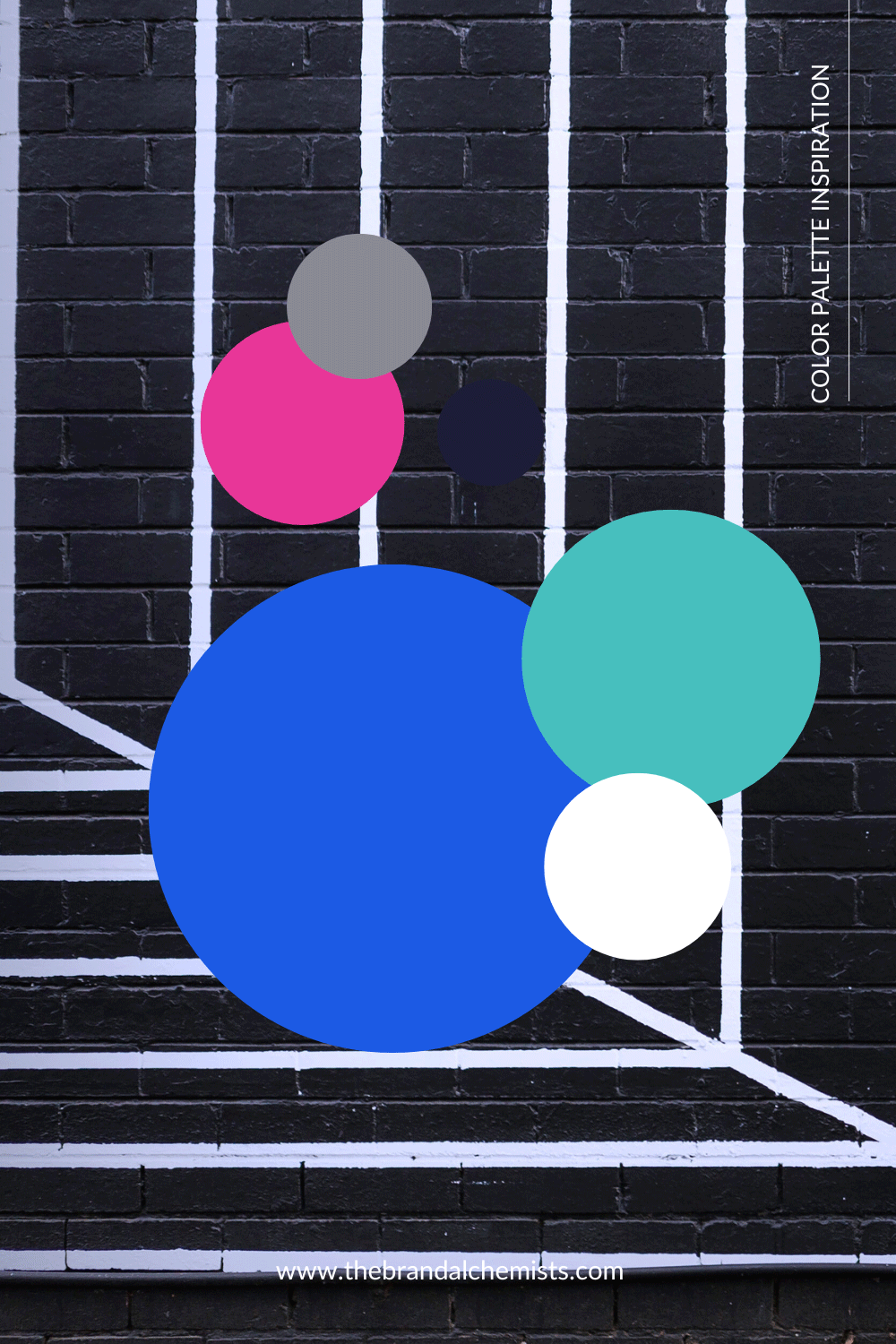 Vibrant color circles from the Modern Pop palette displayed over an urban black brick wall with white painted lines, combining bold pink, electric blue, teal, white, grey, and black for a street-style vibe.