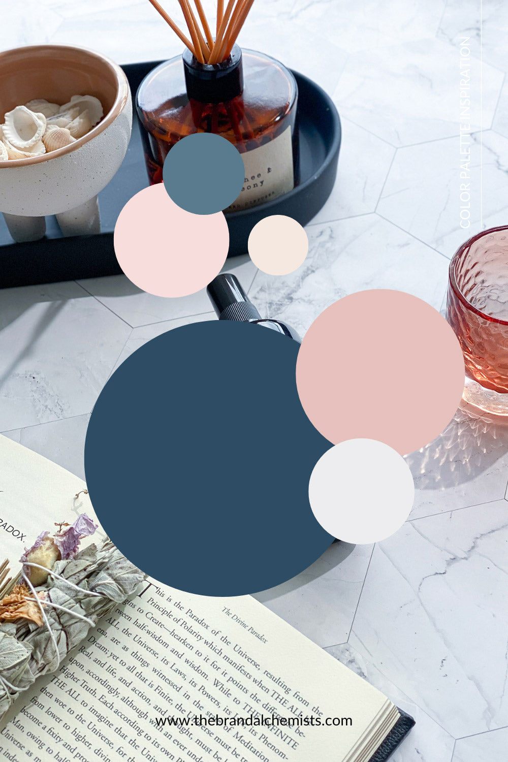 Overlay of the Sunset Lovers color palette on a lifestyle flatlay featuring incense, perfume bottle, and textured glass with natural marble background.